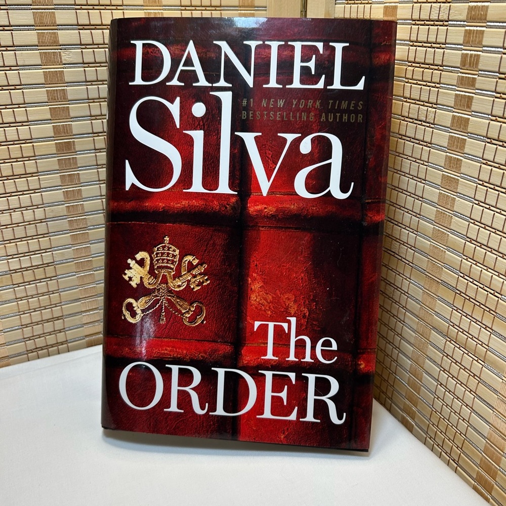 “The Order” Hardback Book